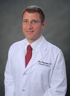 Dr. Adam L Kouyoumjian, Md